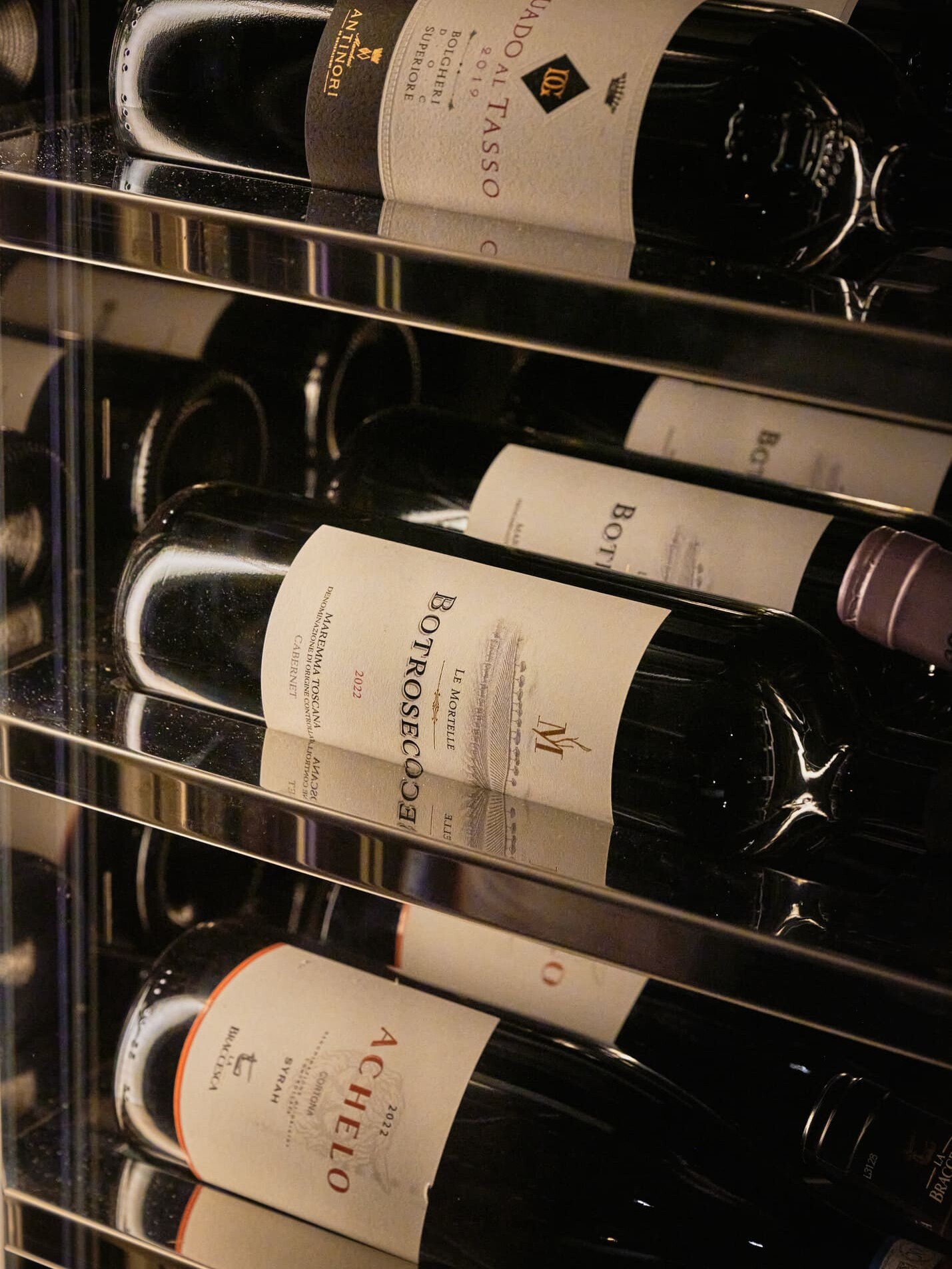 Tuscan wines from the Antinori estates, including Guado al Tasso, Botrosecco and Achelo, in the wine cellar